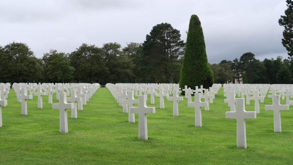 Normandy American Cemetery sits on a cliff overlooking Omaha Beach and the English Channel