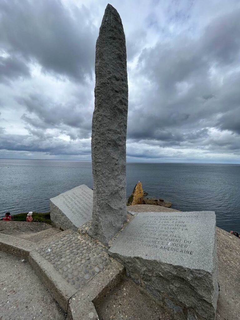 The World War II Pointe du Hoc Ranger Monument is located on a cliff eight miles west of Normandy American Cemetery