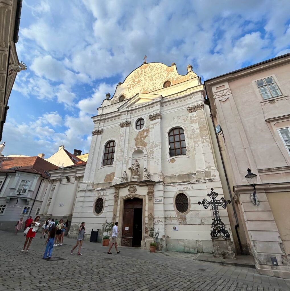 Charming Old Town Bratislava street with traditional European architecture.