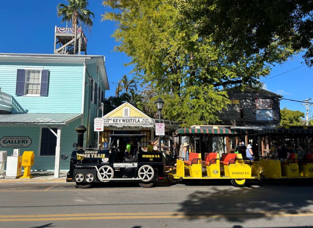 Mallory Square streets lined with shops come alive in the evening with music, shops, and crowd.