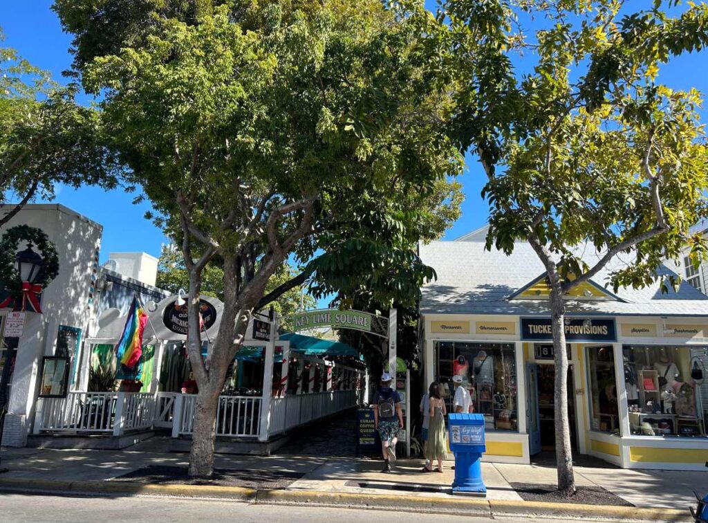 Wandering Duval Street in Key West lined with colorful buildings and lively bars