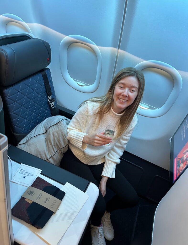 A traveler sharing her experience in Delta One Lounge.