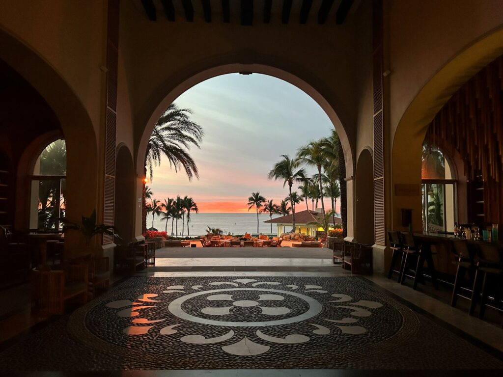 Sunset over Dreams Los Cabos Resort highlighting the stunning Los Cabos coastline