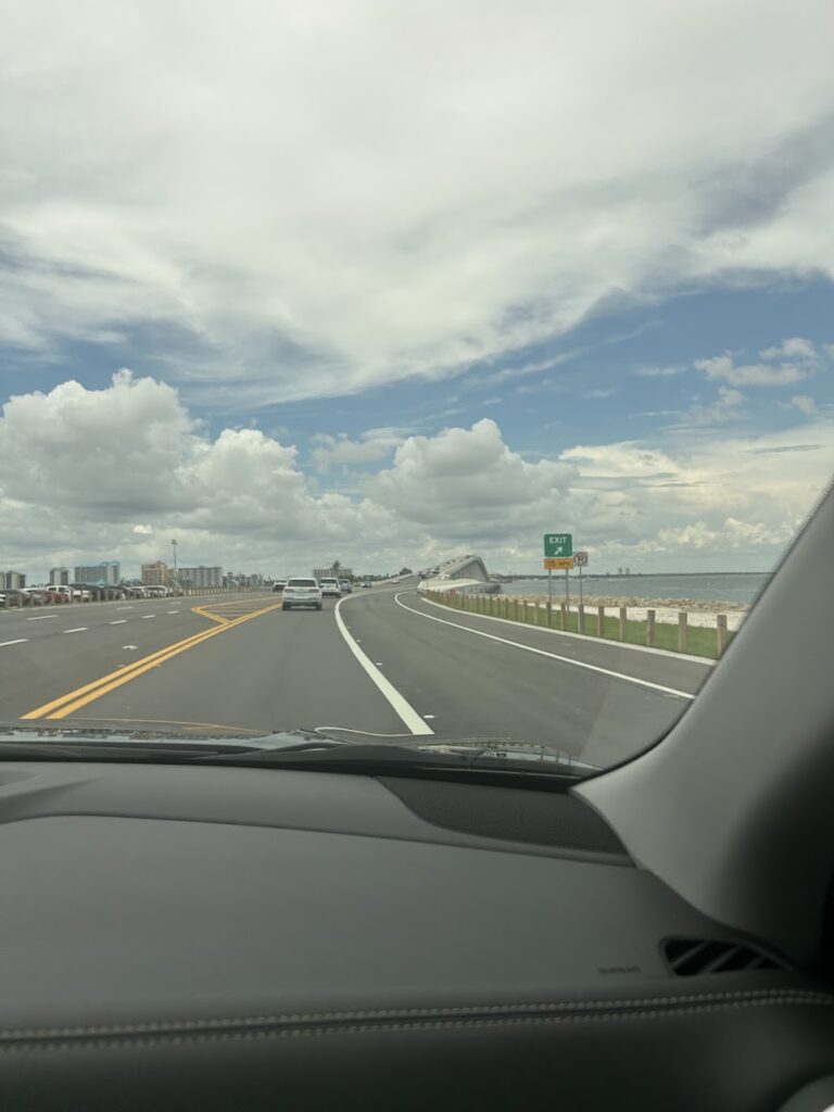 Scenic drive along the Sanibel Causeway with turquoise waters on both sides