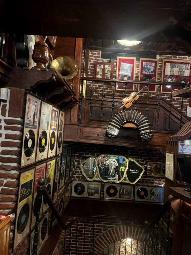 Elegant restaurant interior with traditional Argentine meals at Aljibe Tango