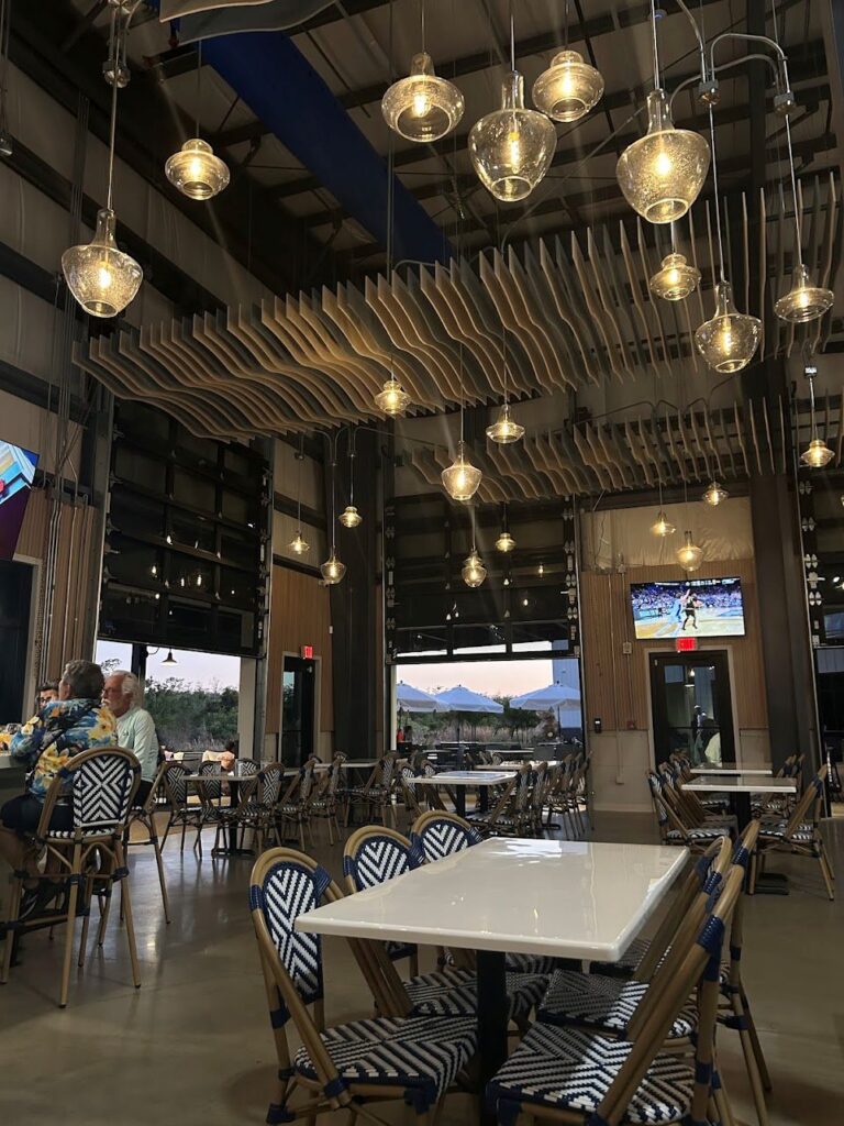 The interiors of Resurgence Brewing Co. in Fort Myers, Florida with TV in every corner for the customers to enjoy matches at the restaurant
