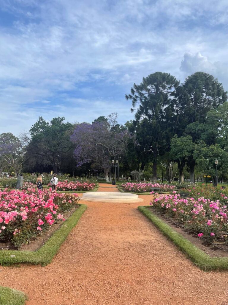 Peaceful garden setting at Parque El Rosedal with bridges and water views