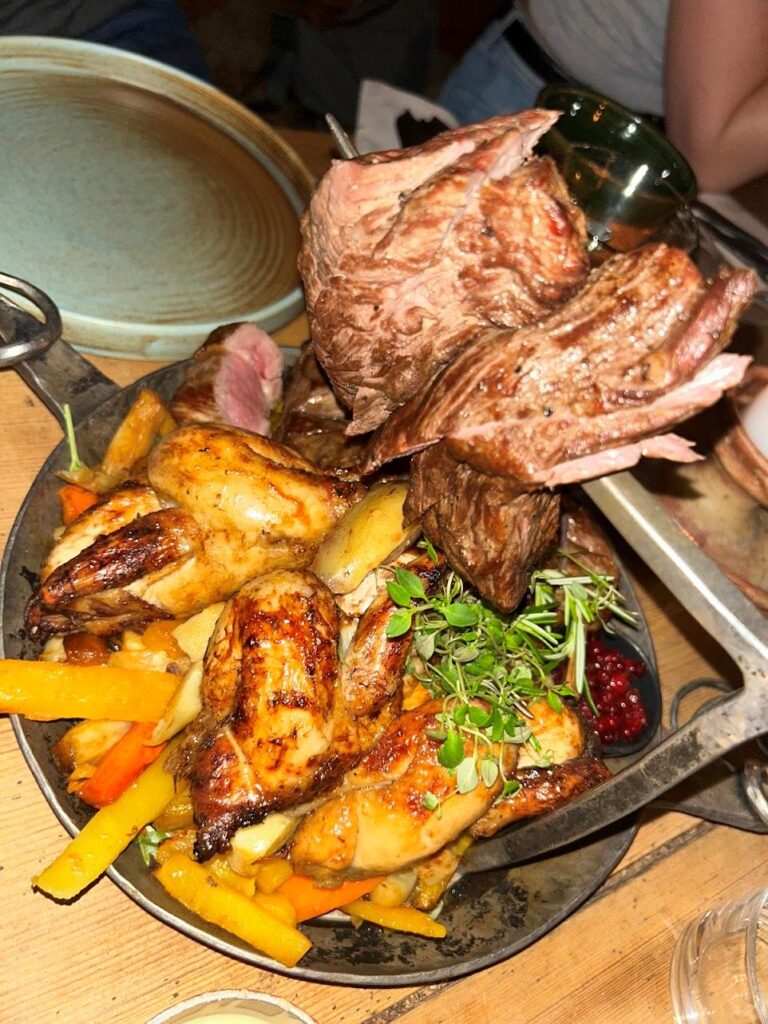 Guests enjoying Traditional Nordic meal served at Aifur Krog & Bar on a Stockholm visit.