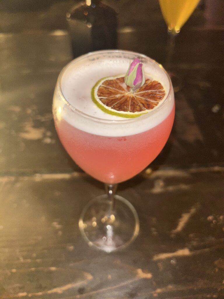 Cocktail experience at Galdrs Krypta blending magic-inspired décor, moody music, and creative drinks