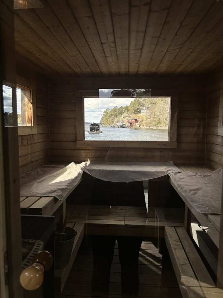 Cozy floating sauna with panoramic sea views in the Baltic archipelago.