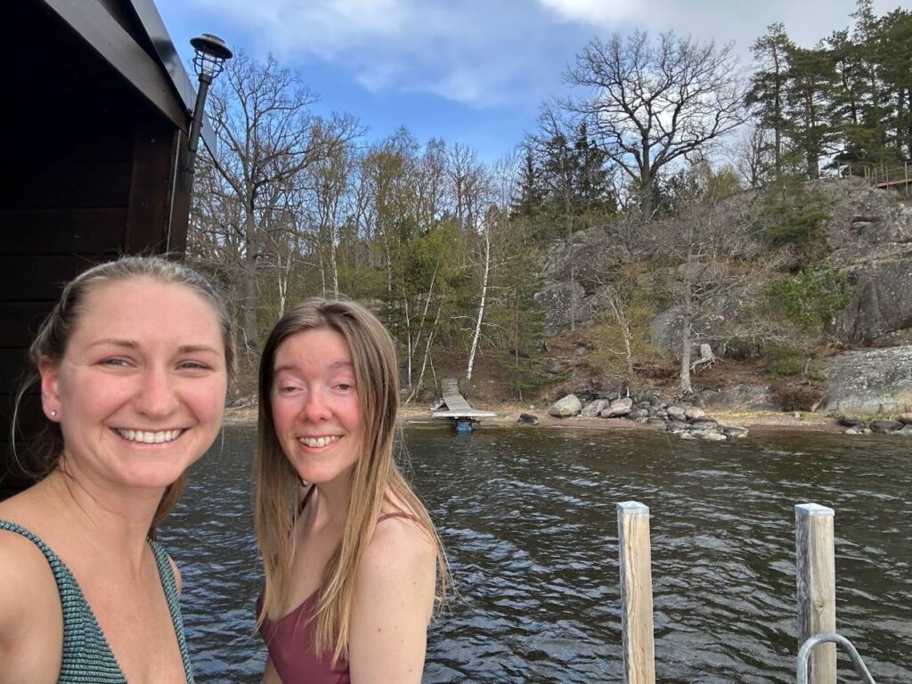 Travelers enjoying authentic Nordic floating sauna adventure in the peaceful Stockholm islands.