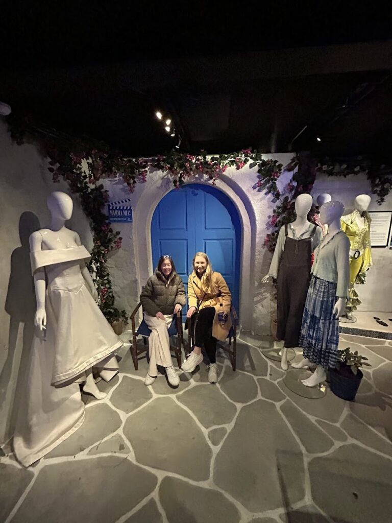Visitors exploring costumes and records at ABBA The Museum