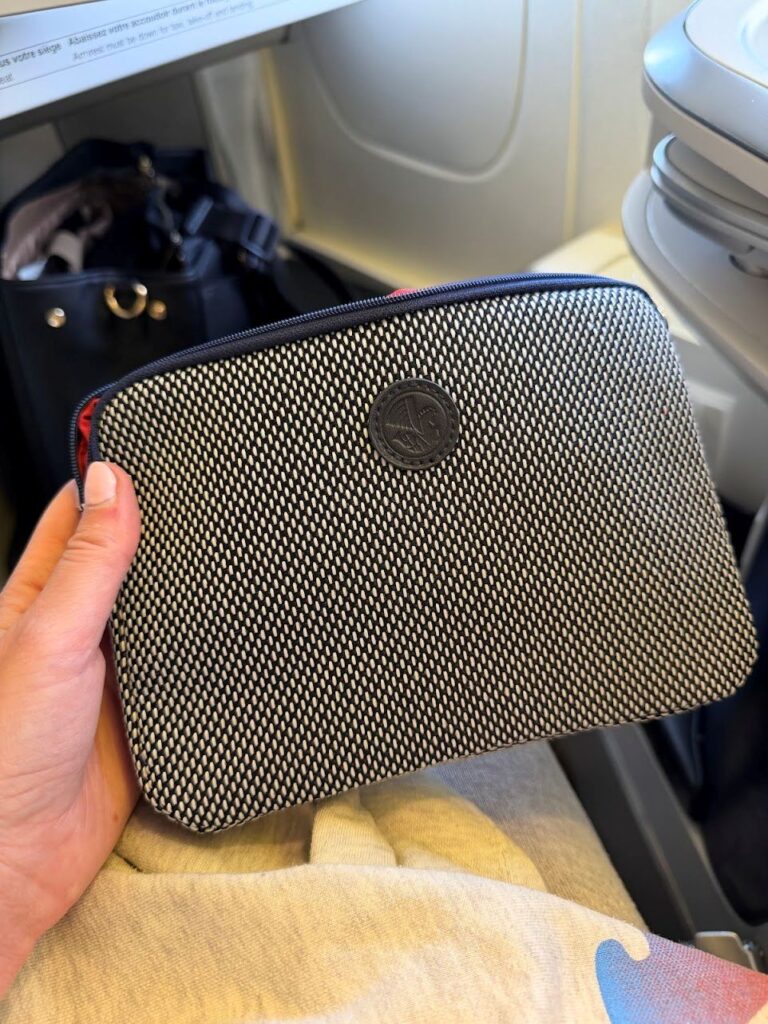 The in-flight amenities fr the Business class includes a skincare range by Clarins in a sleek pouch.