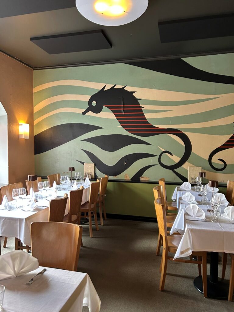 Cozy dining room at Restaurant Seahorse with vintage décor and traditional Finnish cuisine