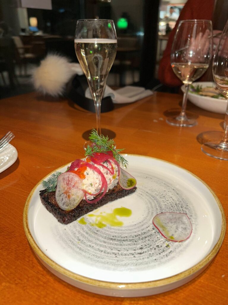 Elegant dining experience at Hilton Helsinki Kalastajatorppa with seasonal Nordic dishes and panoramic sea views