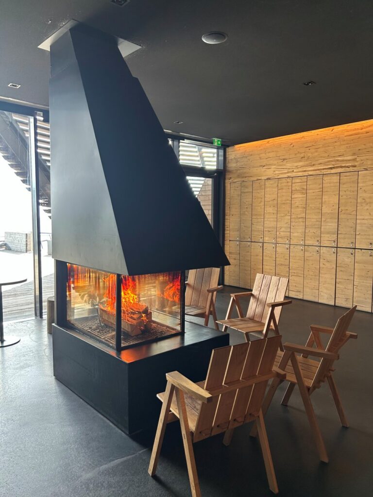 Fireside relaxing area between sauna sessions at Löyly in Helsinki