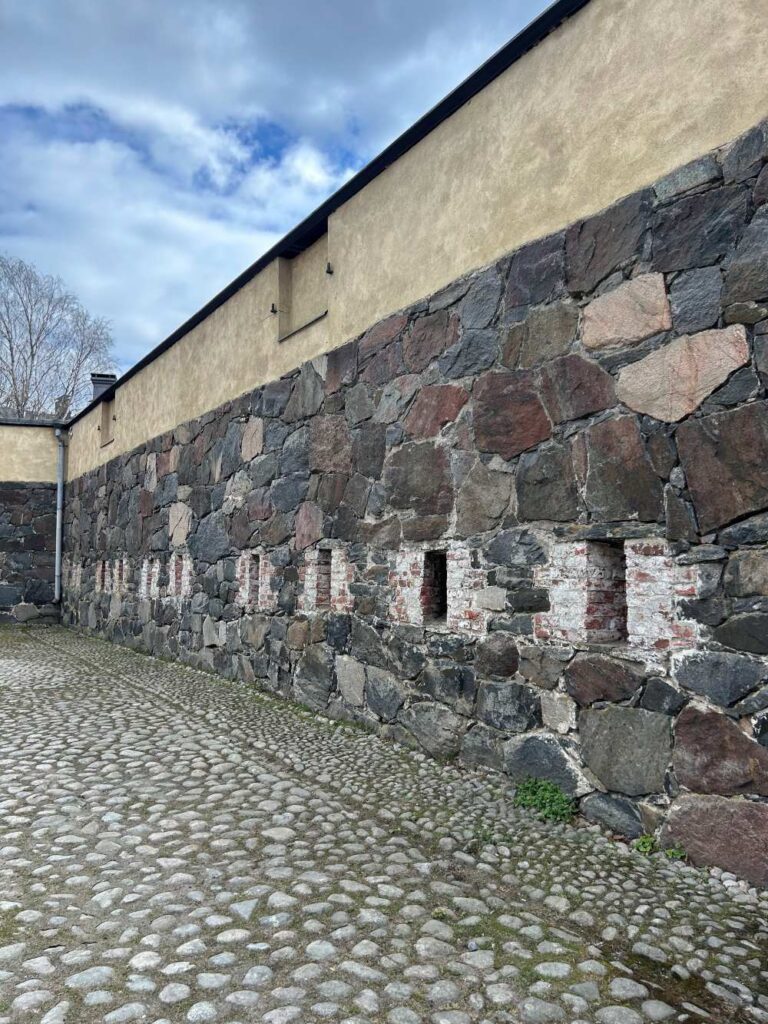 Stone passageways and fortified walls inside Suomenlinna Fortress
