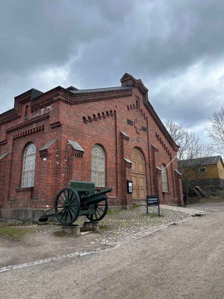 Red stone historical building at Suomenlinna, a UNESCO Heritage Site in Finland