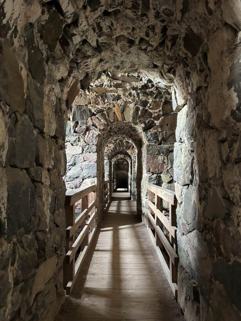 Arched passageway carved through the fortifications of Suomenlinna Fortress