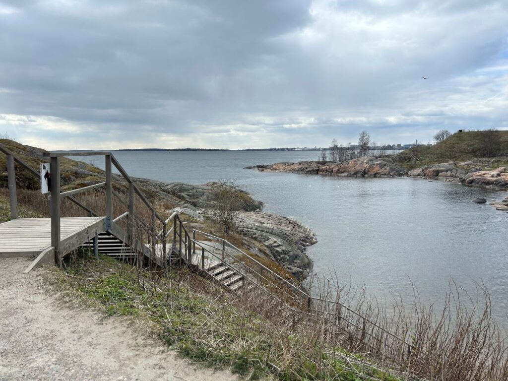 Fortress ramparts extending toward the coastline at Suomenlinna Fortress