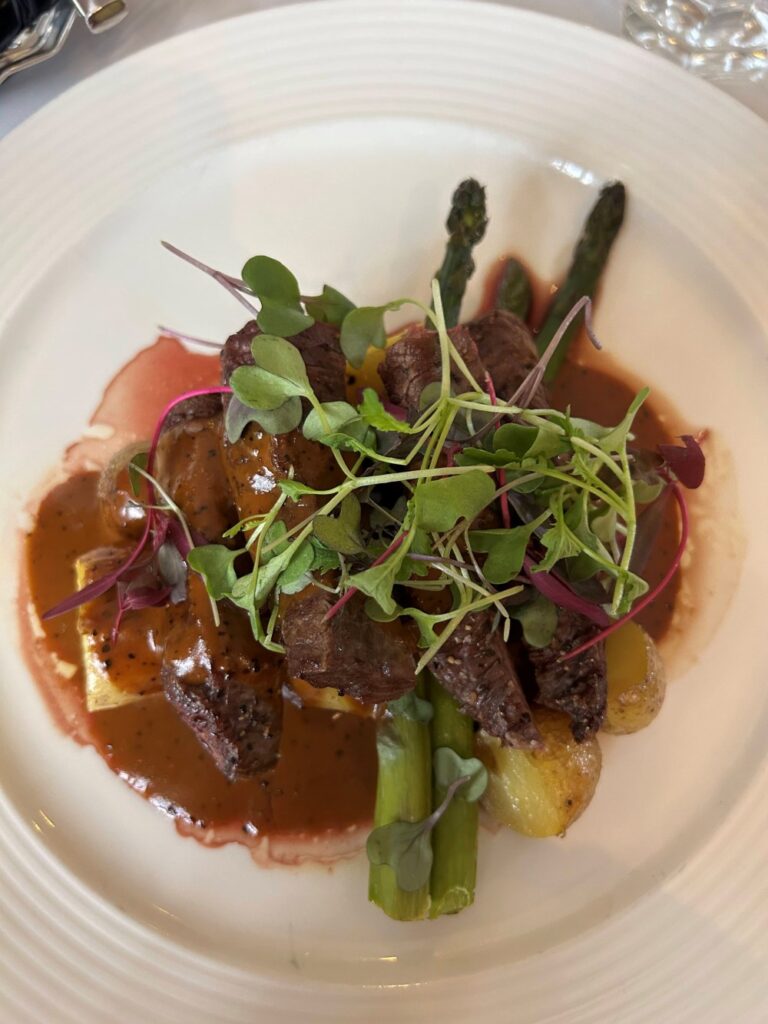 Hearty lunch of steak served at Suomenlinna Brewery in a historic island setting