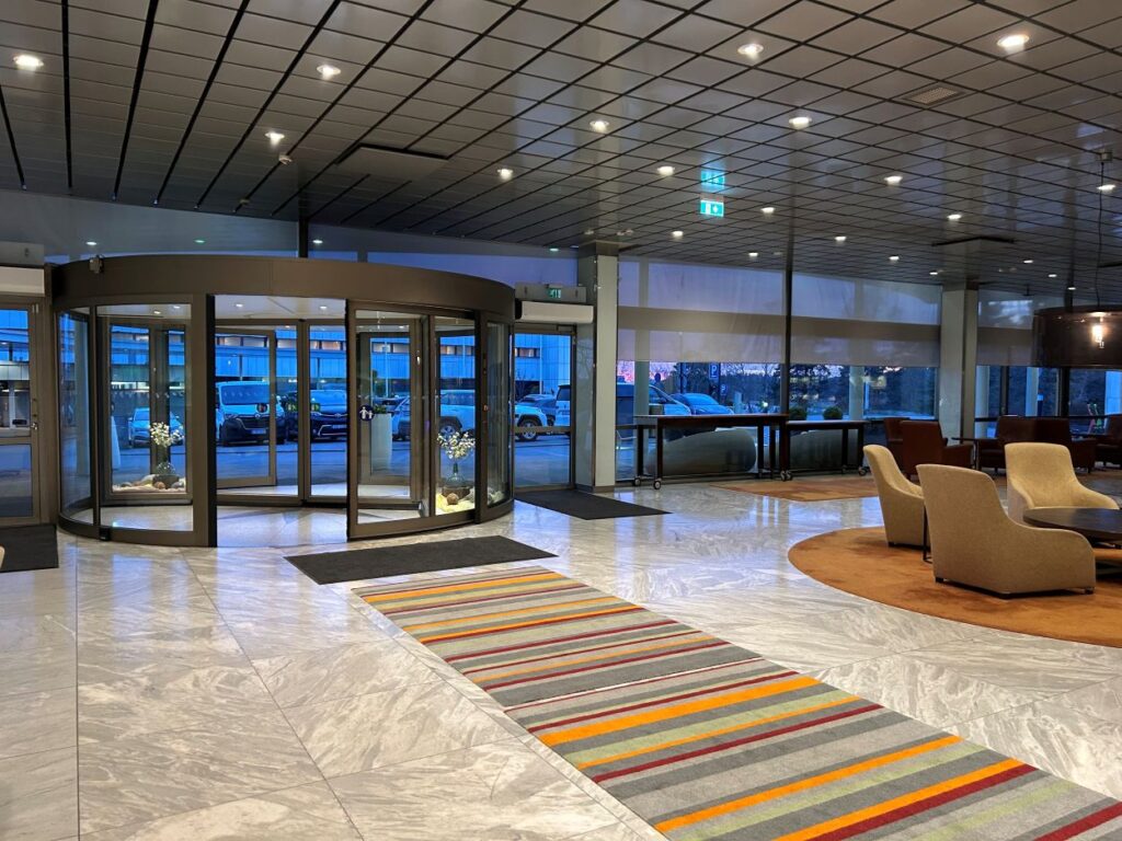 Elegant lobby at Hilton Helsinki Kalastajatorppa featuring classic Scandinavian design