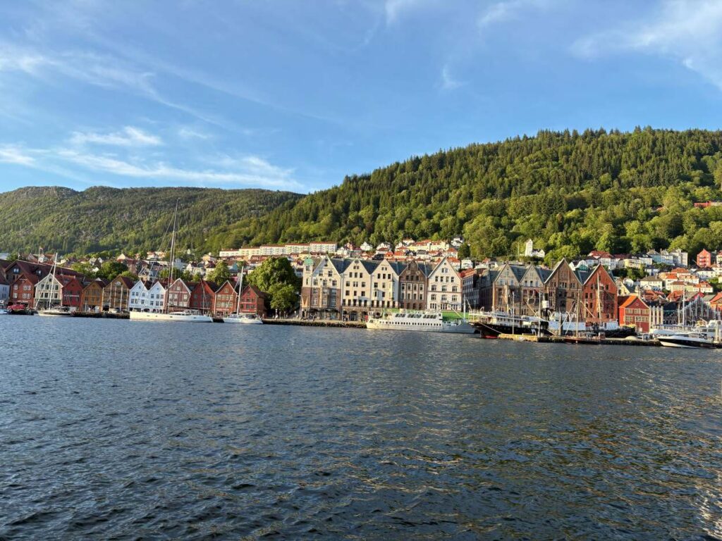 Picturesque harbor scene at Bryggen with boats and colorful architecture