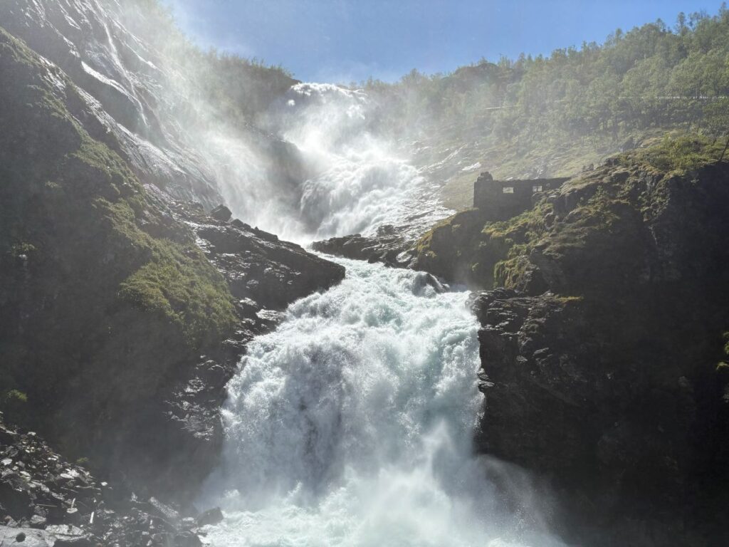 Spectacular views of waterfalls and steep cliffs from the Flåm Railway