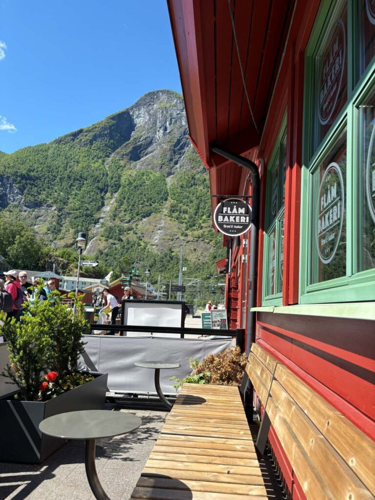 Breakfast and coffee at Flam Bakery surrounded by the scenic mountains of Flåm