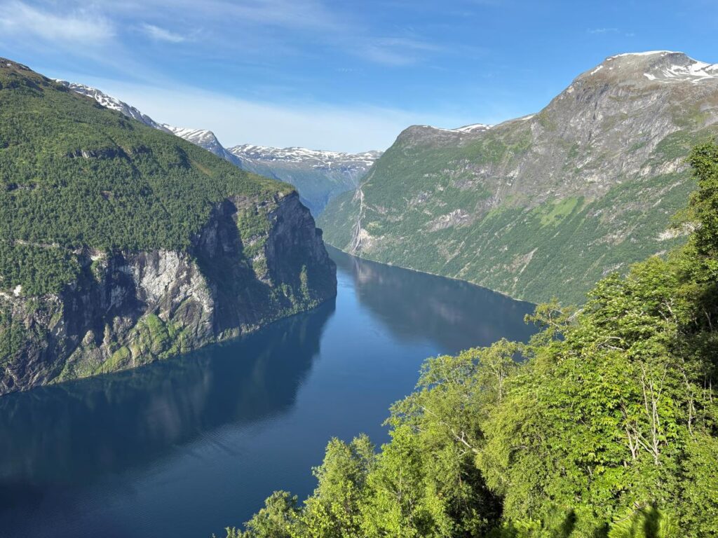 Breathtaking scenery of Geirangerfjord with emerald waters and dramatic cliffs