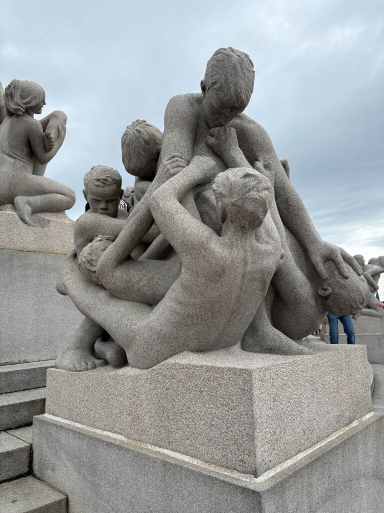 Bronze and granite sculptures by Gustav Vigeland displayed throughout Frogner Park.