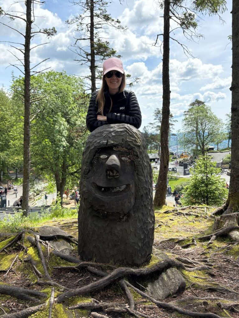 A traveler atop the scenic Mount Fløyen