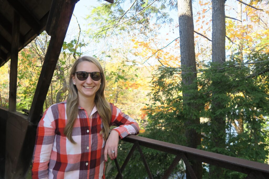 A tourist enjoying fall foliage at Woodstock in Vermont