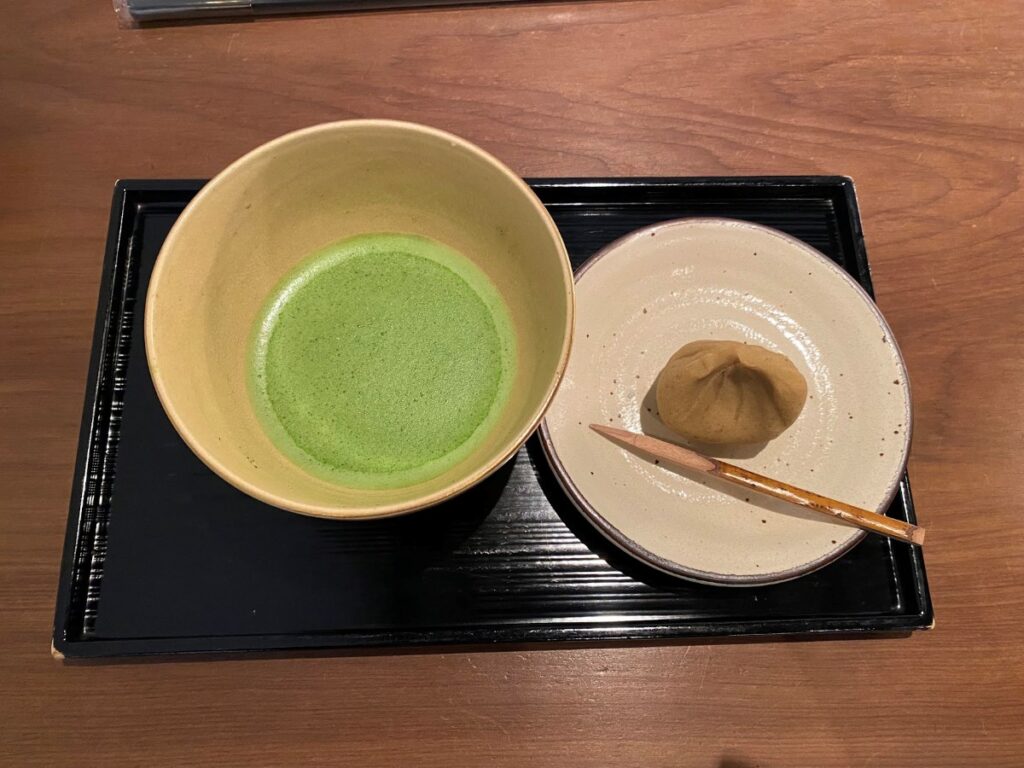 Kyoto in fall is perfect for a matcha break, with traditional tea houses serving rich green tea beside colorful autumn foliage.
