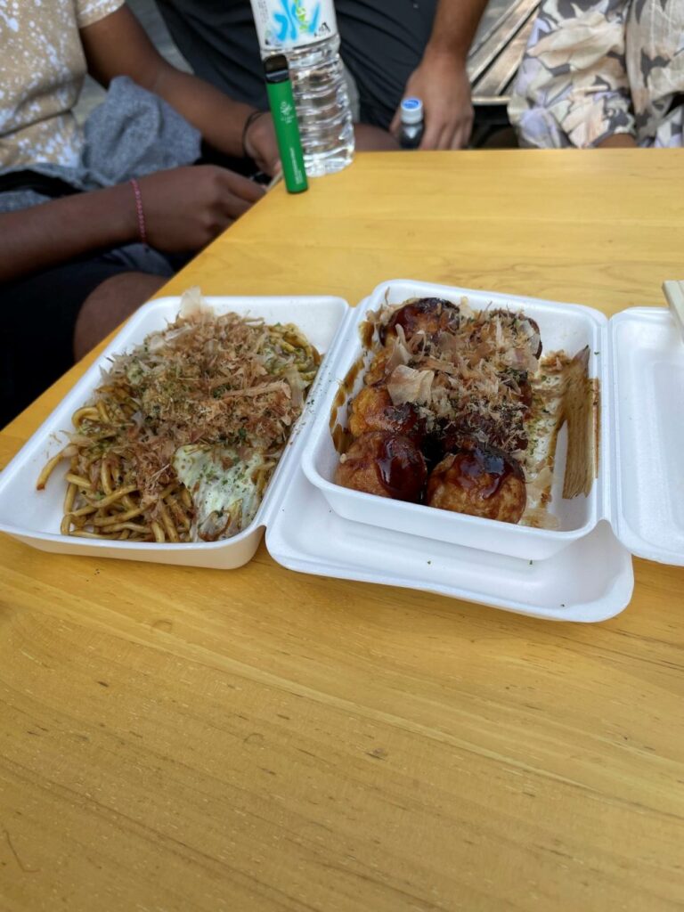 A popular Japanese street food, specifically takoyaki and yakisoba, in Osaka