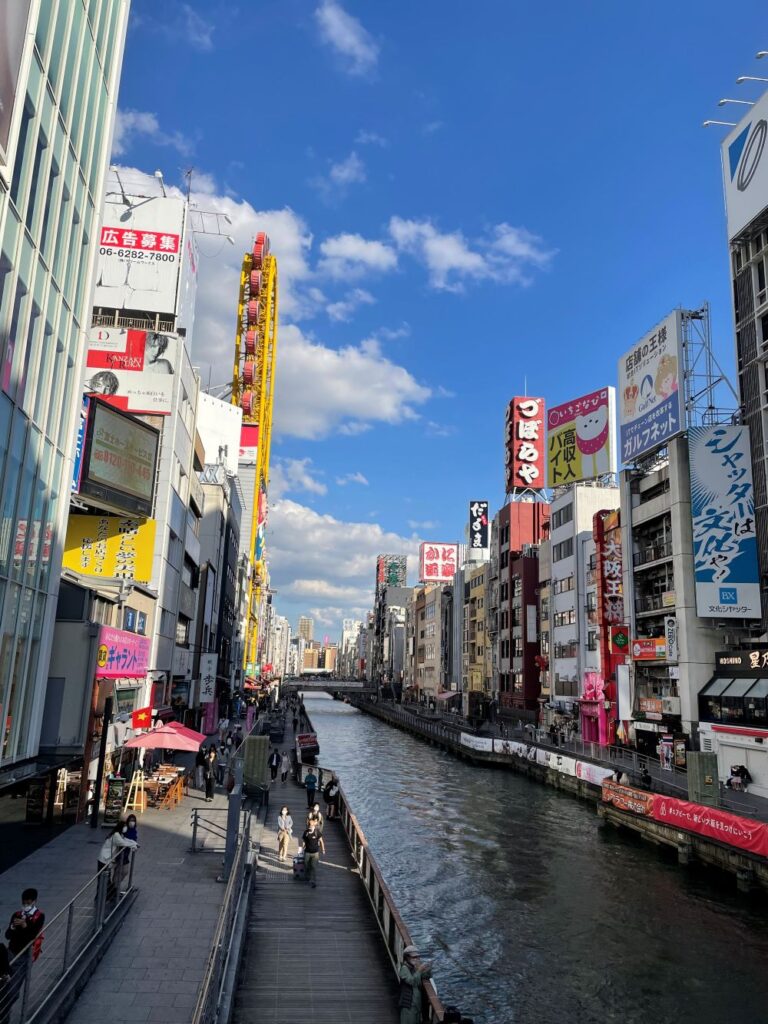 Dotonbori's famous canal, neon signs, restaurants, and landmarks explored during a three-day Osaka itinerary