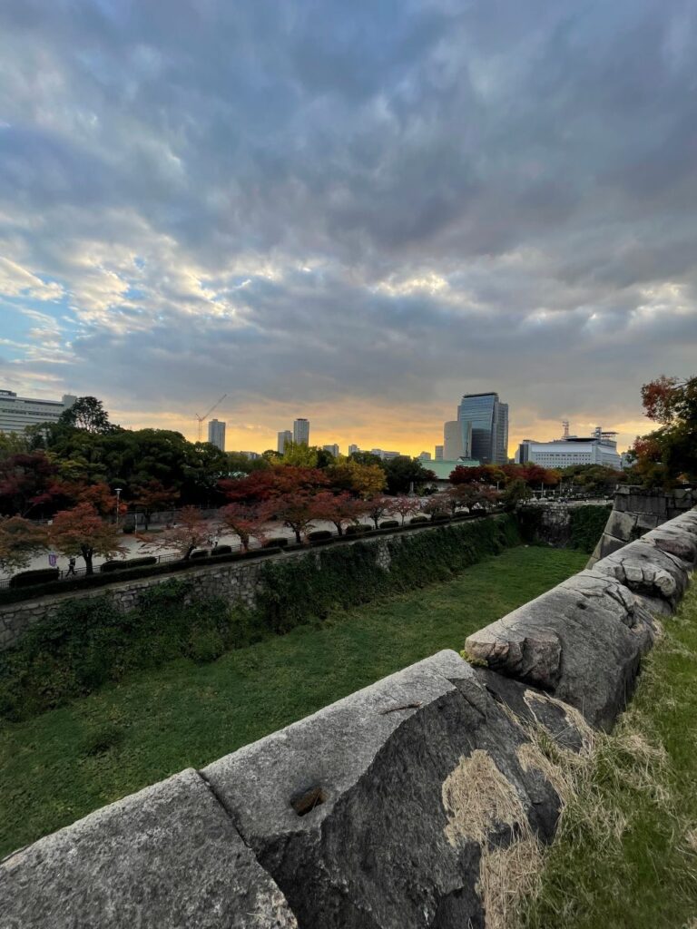 Historic Osaka Castle surrounded by the castle grounds and gardens during a visit to Osaka, Japan
