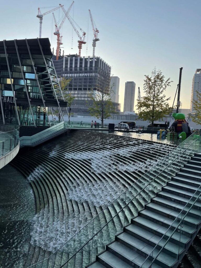 Umeda skyline in Osaka, Japan, with towering skyscrapers, busy streets, and modern city architecture