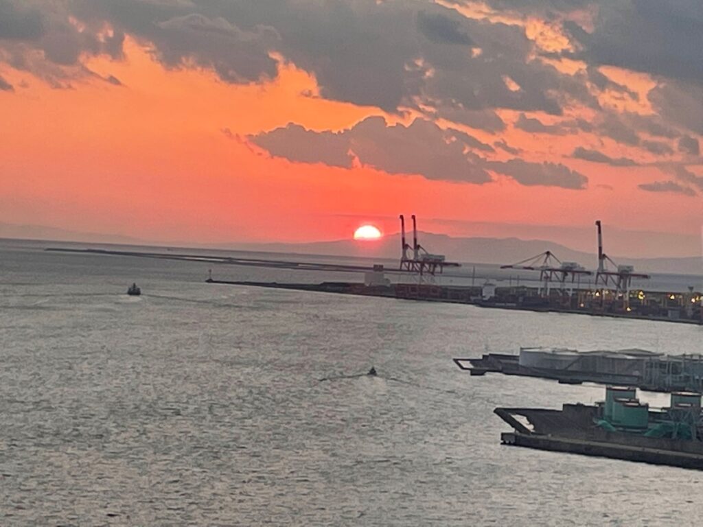 Sunset views from the Tempozan Ferris Wheel overlooking Osaka Bay and the city skyline