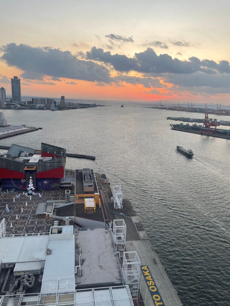 Golden sunset over Osaka Bay seen from the Tempozan Ferris Wheel in Osaka, Japan