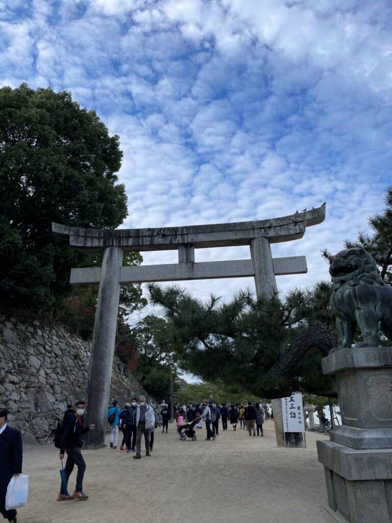 Exploring Miyajima in Hiroshima, Japan, known for its sacred shrine, scenic coastline, and friendly deer