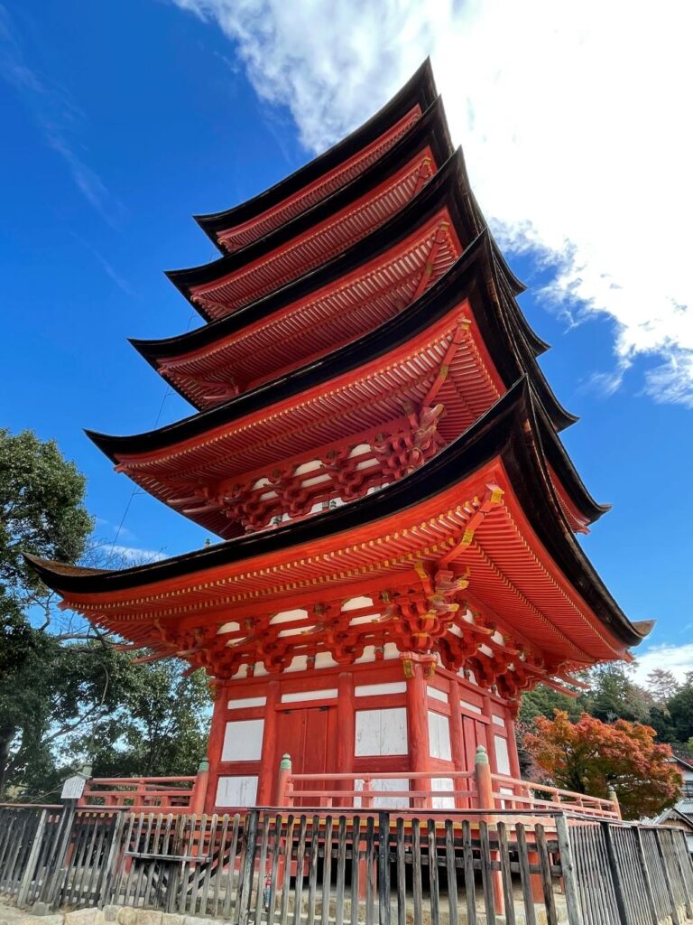 Five-Story Pagoda Gojūnotō on Miyajima Island, Hiroshima, with its striking vermilion structure rising above the historic town