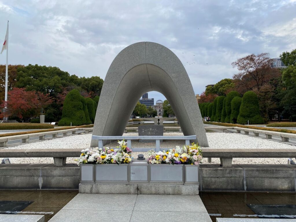 Hiroshima Peace Memorial Park with the Peace Flame and monuments surrounded by trees in central Hiroshima