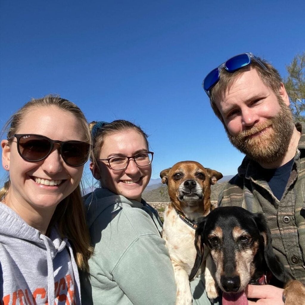 Bob, a disabled dog with his pet parents and dog friend on a trip.