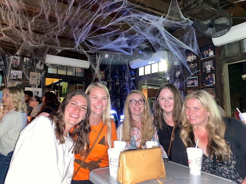 Visiting Lafitte’s Blacksmith Shop Bar on a haunted two-day New Orleans adventure, surrounded by historic French Quarter streets