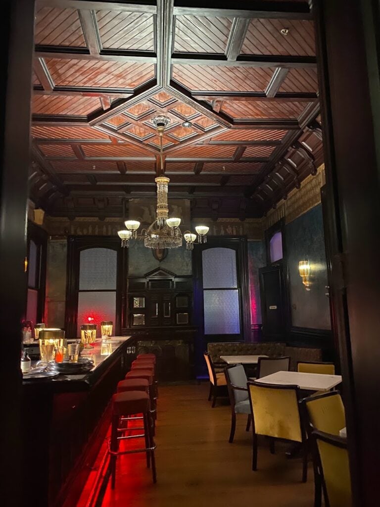 The Columns Hotel on a 2-day New Orleans ghost itinerary, surrounded by the grand homes of the Garden District